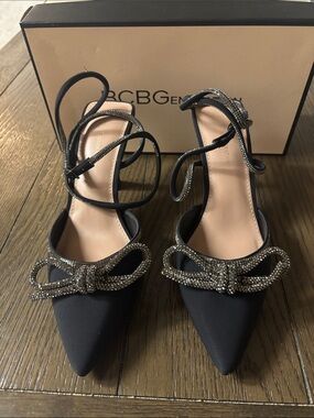 BCBGeneration Black Pointed Toe Bow Flats with Rhinestone Straps